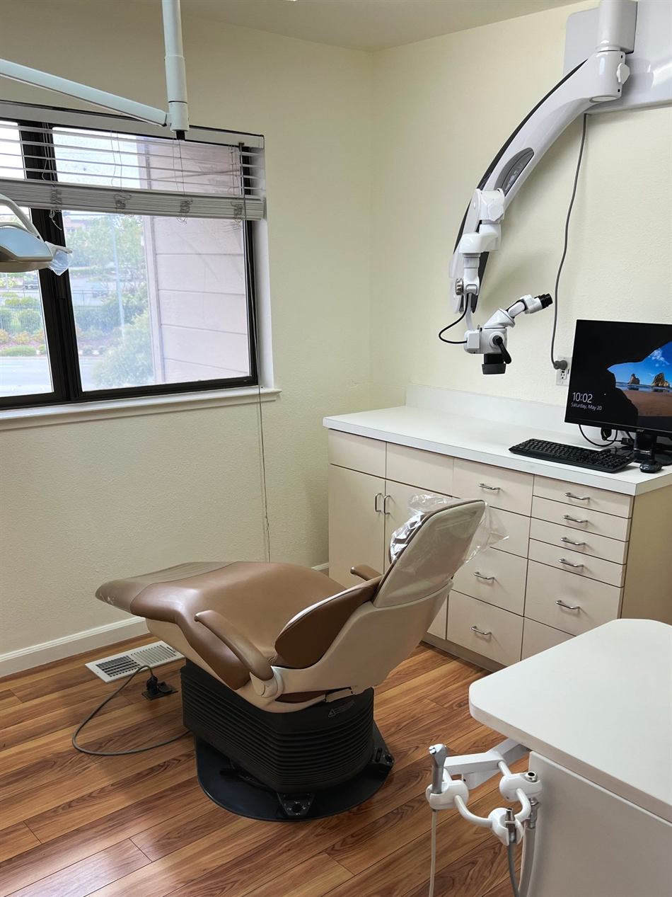 Dr. Cross reviewing findings in a treatment room